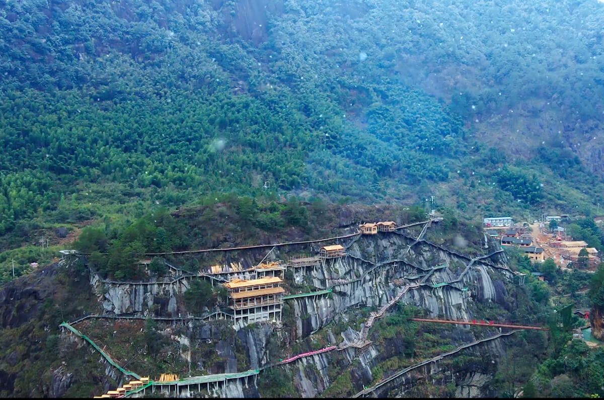 Cliffside buildings in Wangxian Valley